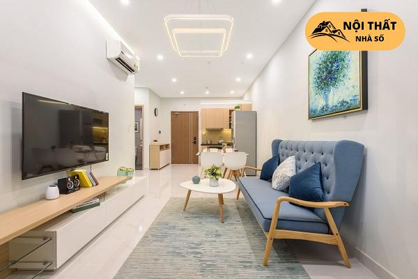 Góc hình được chụp thì phía phòng khách với thiết kế ghế xanh dương độc đáo