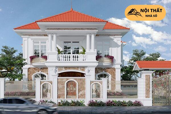 Ngôi biệt thự mái đỏ có ban công hình bán nguyệt được “lấp đầy ” sắc đỏ của hoa nổi bật