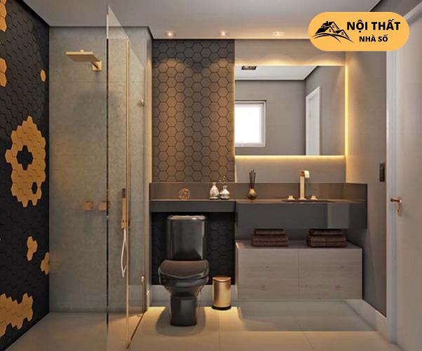 Tông đen vàng giúp cho phòng vệ sinh sang trọng hơn